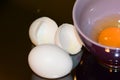 Beaten eggs in bowl with salt