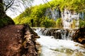 Beaten track near a forest lake and waterfall in Plitvice Lakes Royalty Free Stock Photo