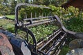 Flowers and plants in the beaters of an old manure spreader