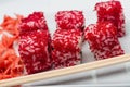 Beaters from rice with red fish roe, marinated ginger and wooden sticks Royalty Free Stock Photo