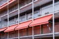 Beatiful balcony with coral awning in apartment house