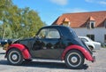 Beatiful black and red old timer at a car show in oudenburg, Belgium