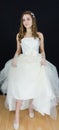 Beatiful bride on black background. dress