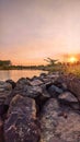 beatiful lake with rocks in the evening sun Royalty Free Stock Photo
