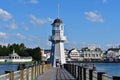 Beatiful lighthouse on Boardwalk and lightblue cloudy background, at Lake Buena Vista area.