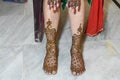 Beatiful mehndi art in legs and feet