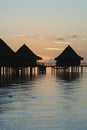 Sunset in Polynesia over houses on the water