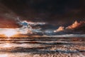 Beatiful sunset with clouds over sea and beach Royalty Free Stock Photo