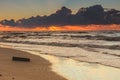 Beatiful sunset with clouds over sea and beach Royalty Free Stock Photo