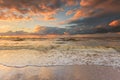 Beatiful sunset with clouds over sea and beach Royalty Free Stock Photo