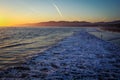 Beatiful susnet over Santa Monica beach with ocean waves