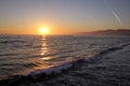 Beatiful susnet over Santa Monica beach with ocean waves Royalty Free Stock Photo