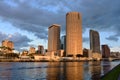 Beatiful view of Skyscrapers, hotels canal and bridge on cloudy sunset background. Royalty Free Stock Photo