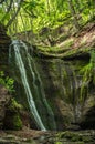 Beatiful waterfall in spring forest. Carpathian, Ukraine.