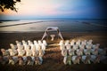 Show chairs set for wedding or another catered event dinner on the beach Royalty Free Stock Photo