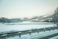 A beatiful winter scenery with a road. Woods in Norway. Royalty Free Stock Photo