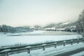 A beatiful winter scenery with a road. Woods in Norway.