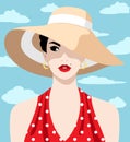 Beatiful woman wearing large sun hat and red dress