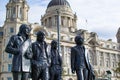 The Beatles Statue in Liverpool Waterfront Pier Head, a very famous spot to take a picture in Liverpool, England