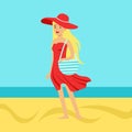 Beatuful woman in a red dress and beach hat against a bright blue sky and sea on a holiday beach