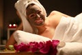 Beaty woman applied chocolate mask in spa salon Royalty Free Stock Photo