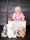 Beau with his Plush Toys Royalty Free Stock Photo