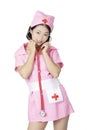 Chinese woman dressed as nurse isolated on white background