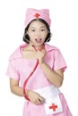 Chinese woman dressed as nurse isolated on white background