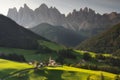 Sunrise in Dolomites with beautiful Santa Maddalena village in front of the Geisler or Odle Dolomites Group