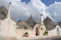 Beauiful Alberobello Trulli Houses under Blue Sky Apulien, Italien