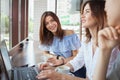 Beautiful female friends enjoying morning coffee at the cafe together Royalty Free Stock Photo