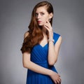 Beauitiful young woman in blue dress