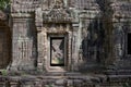 Beauitul stone door at Ta Prohm temple building in Cambodia Royalty Free Stock Photo