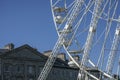 Beaumaris, Wales - the Ferris wheel and some stone houses. Royalty Free Stock Photo