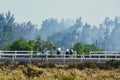 Beaumont and Banning , California fire fighters responding to a grass fire as thankfull homeowners watch Royalty Free Stock Photo