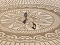 Beaustiful sand mandala with its artist named Vitor Raposo