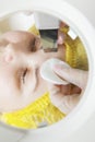 Beautician hands at face cleaning procedure Royalty Free Stock Photo