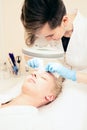 Beautician makes cleansing. female specialist cosmetologist removes comedones. Spa. healthy lifestyle concept