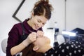 Beautician making eyelash lamination procedures. Modern eyelash care treatment procedures - staining, curling, laminating and