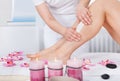 Beautician waxing woman's leg Royalty Free Stock Photo