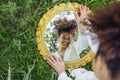 Beautifal mixed race woman wearing white dress and sky reflectio