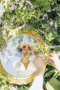 Beautifal mixed race woman wearing white dress and sky reflectio