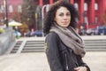 Beautifil brunette caucasian woman in leather jacket and scarf w