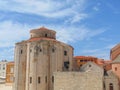 Beautifil view of church saint Donat in the city of Zadar, Croatia against white clouds and blue sky