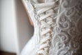 Beautifil white wedding dress on brides back