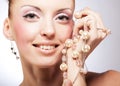 Beautifu lwoman with big pearl beads, beauty and youth, happiness and innocence