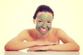 Beautifu toplessl woman with facial mask. Royalty Free Stock Photo