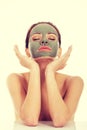 Beautifu toplessl woman with facial mask. Royalty Free Stock Photo