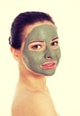 Beautifu toplessl woman with facial mask. Royalty Free Stock Photo
