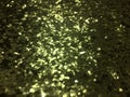 Beautiful abstract background of gold color. Brilliant shimmering texture Royalty Free Stock Photo